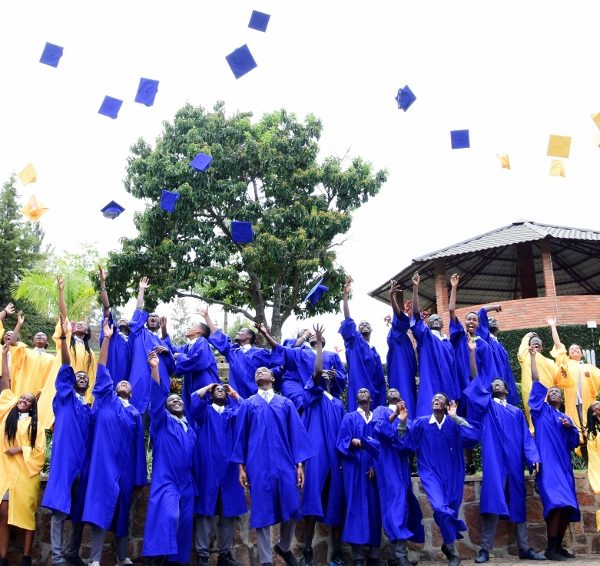 2015 graduating class throwing their caps