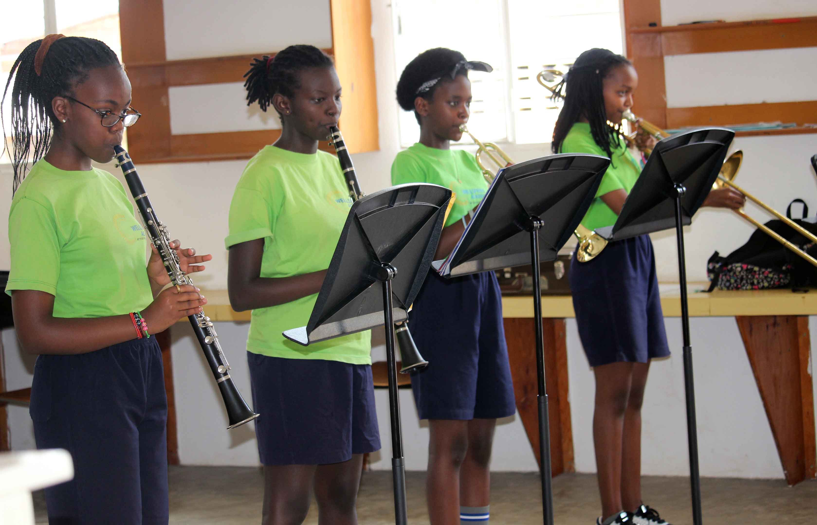 students playing band instruments