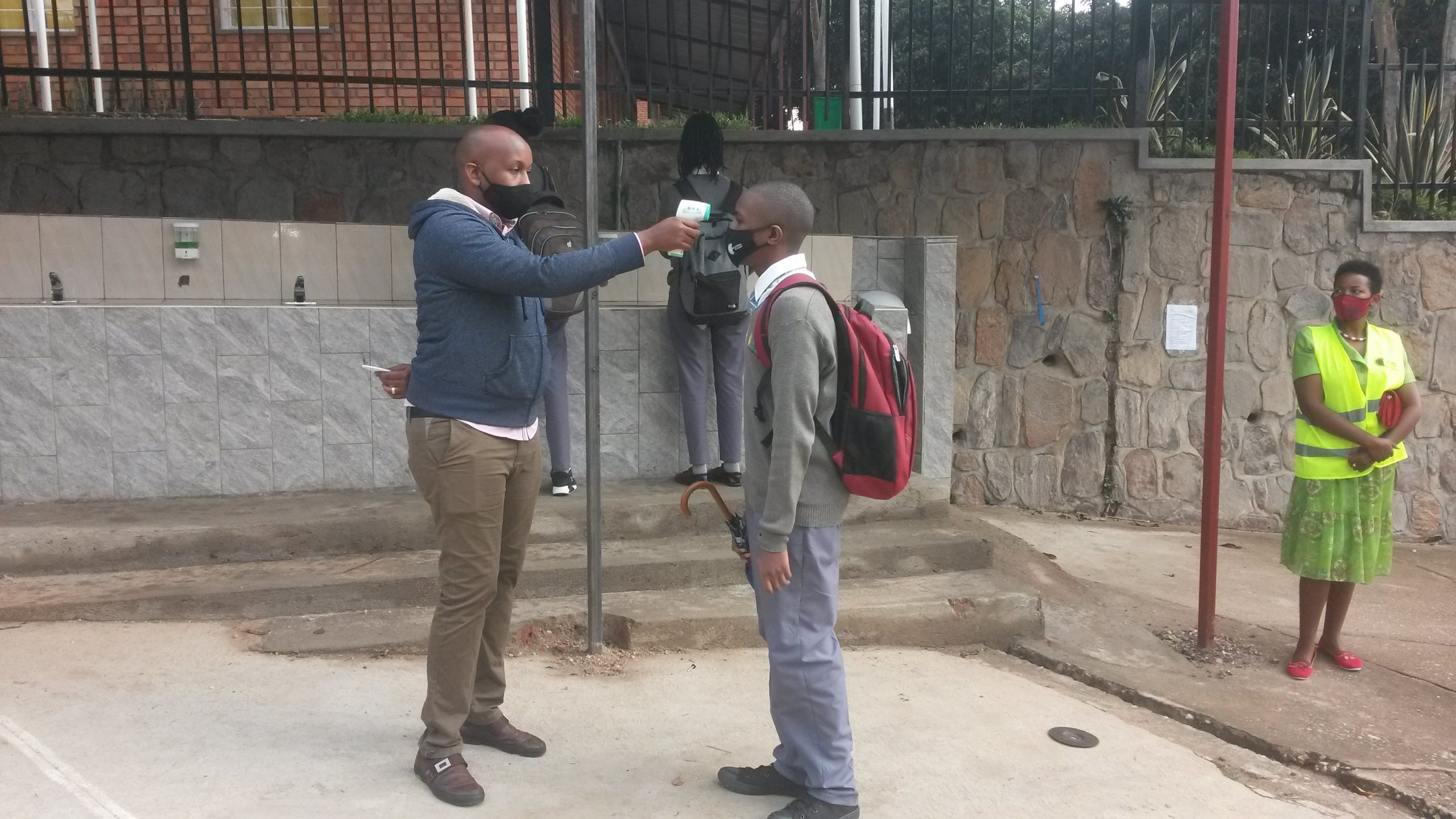 A student being screened by an agent of Health care